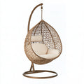 Poltrona sospesa in rattan marrone con supporto in metallo, dimensioni 105x105x195 cm, ideale per interno.