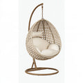 Poltrona sospesa in rattan beige con supporto in metallo, dimensioni 105x105x195 cm, stile boho, per relax.