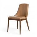 Sedia da pranzo Inqavron in similpelle marrone con gambe in legno, stile moderno, dimensioni 48x58x88 cm